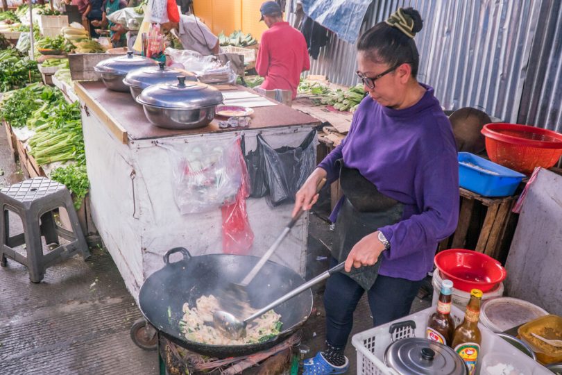 A woman food merchant in Jakarta, Indonesia